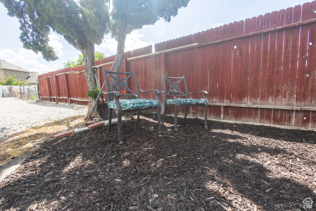 View of fenced backyard