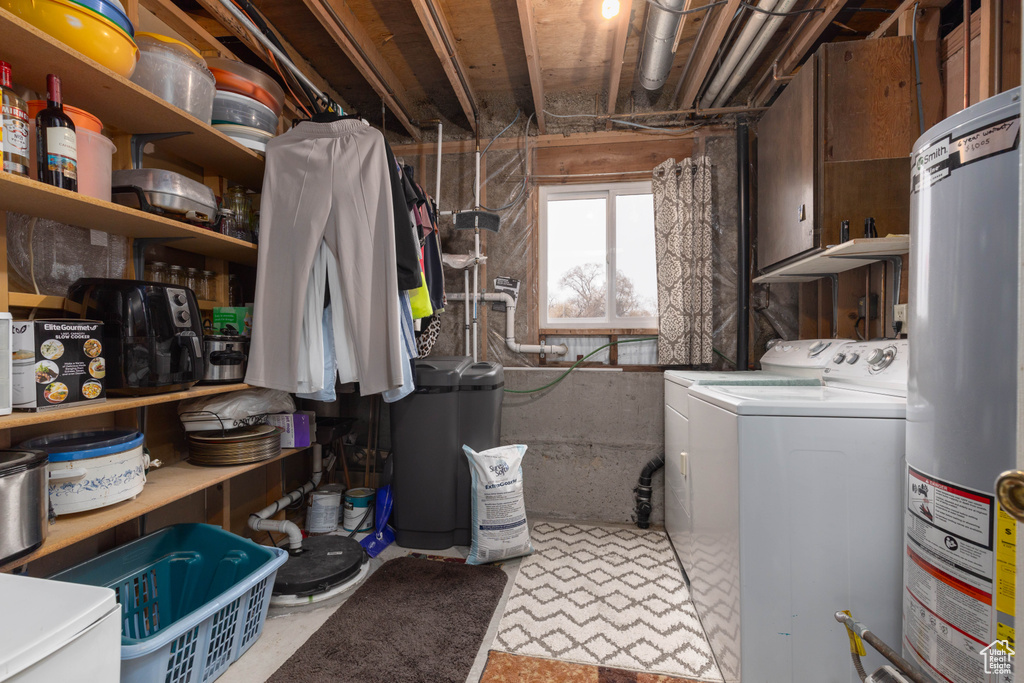 Clothes washing area with gas water heater and separate washer and dryer