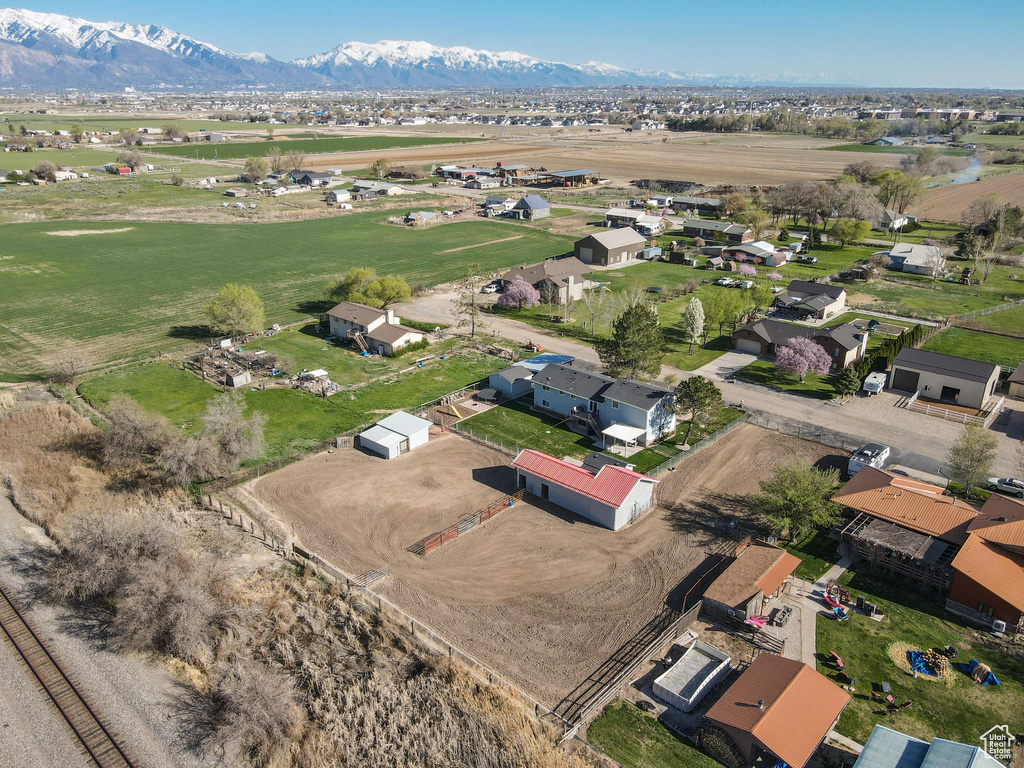 View of property location with a mountain backdrop and nearby suburban area