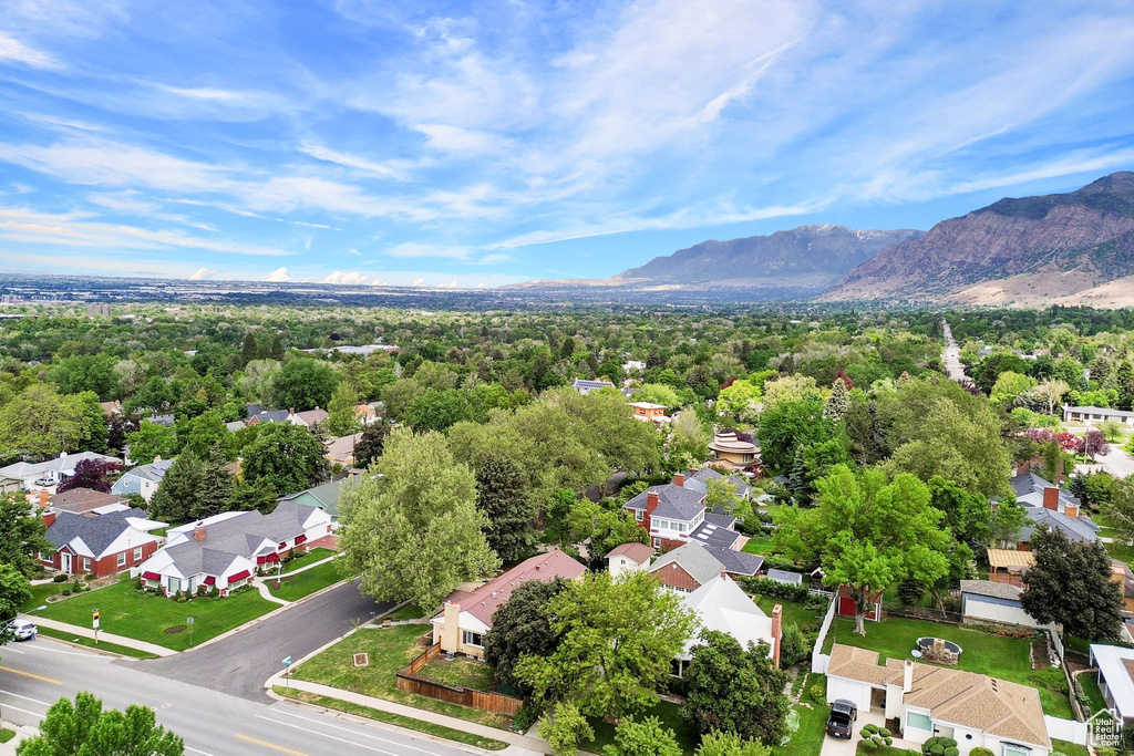 Aerial perspective of suburban area featuring a mountainous background