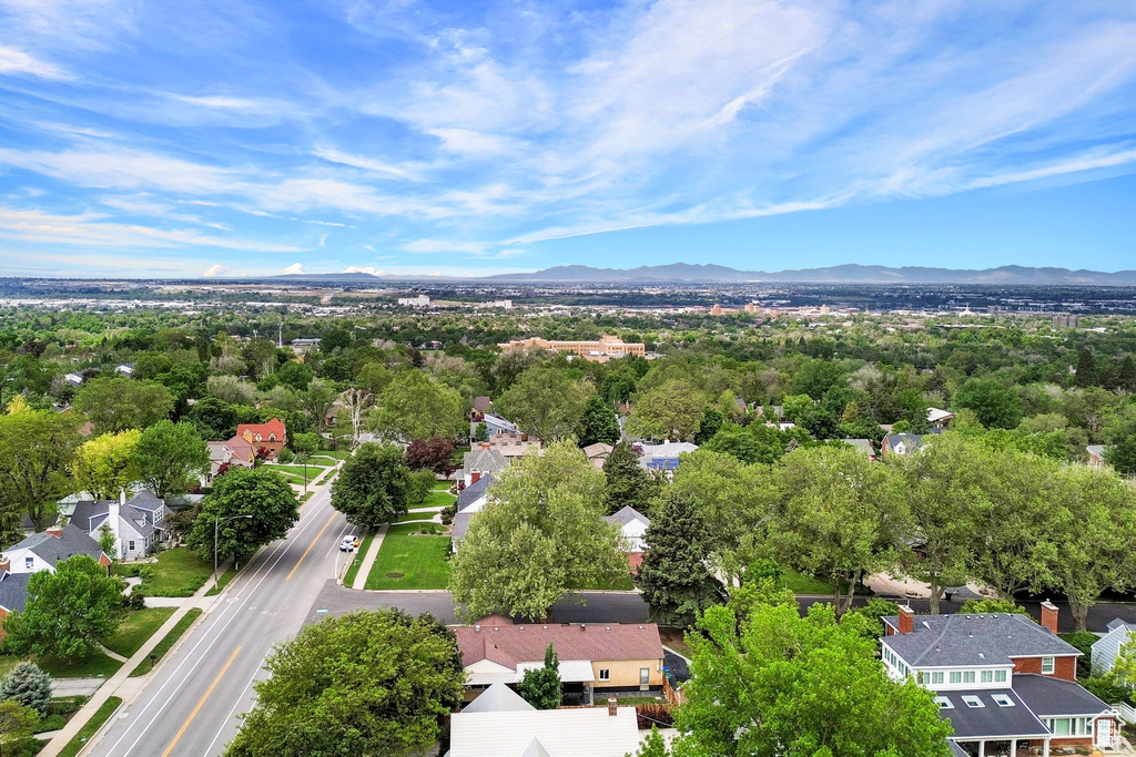 Aerial view of residential area featuring a mountain backdrop
