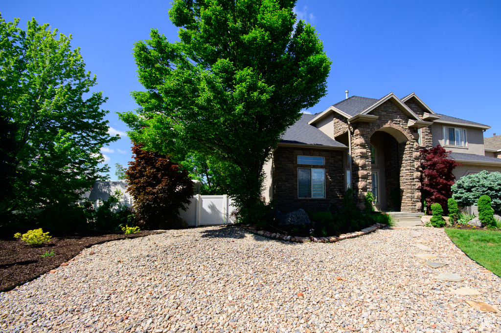 View of front facade with stone siding