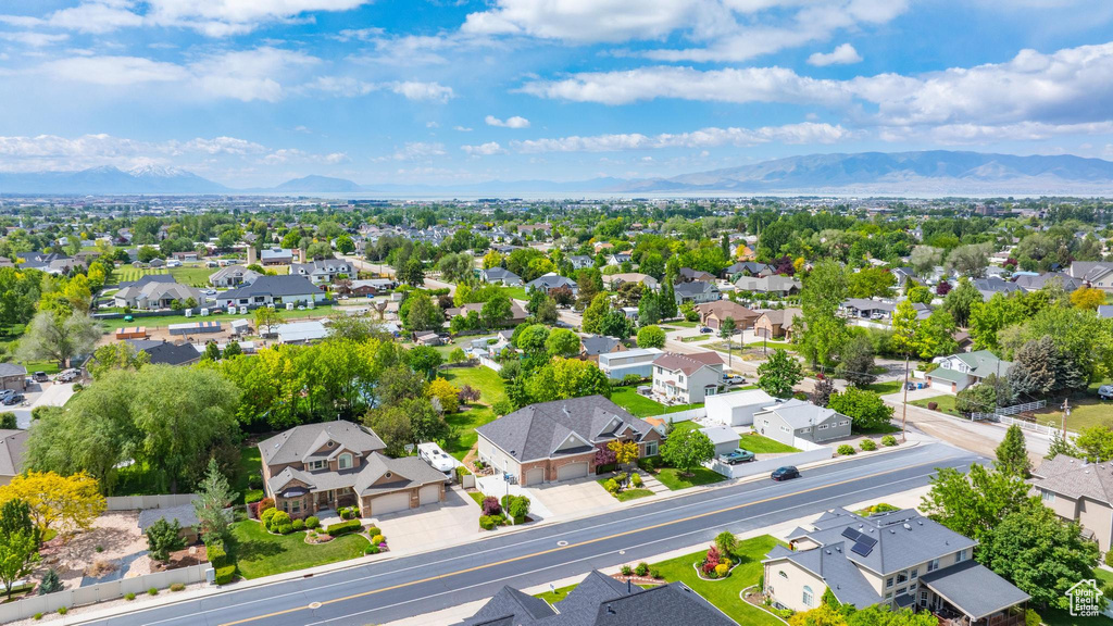 Aerial view of residential area with mountains