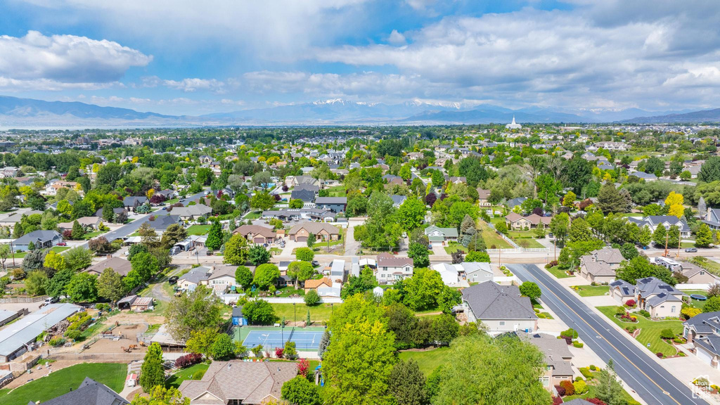 Aerial view of residential area with a mountain backdrop
