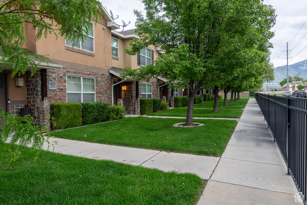Surrounding community featuring a mountain view