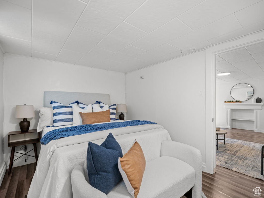 Bedroom with wood finished floors