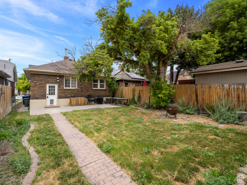 View of yard featuring a patio