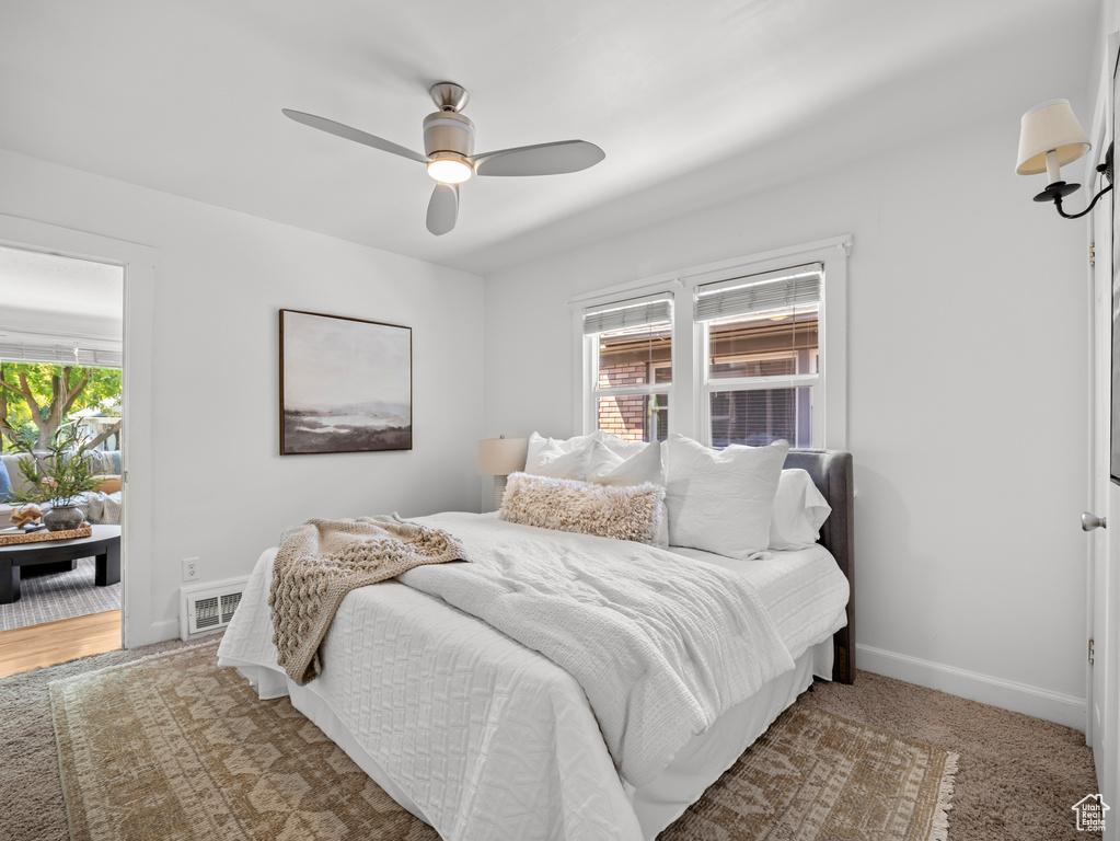 Bedroom featuring baseboards and ceiling fan