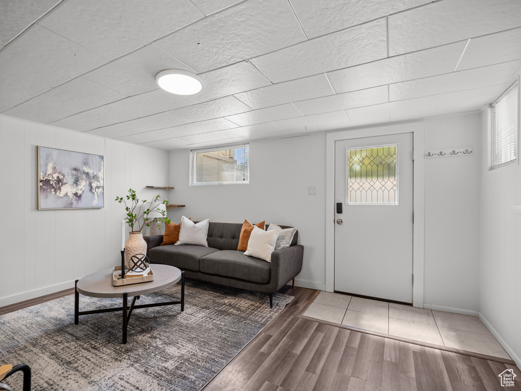 Living area featuring wood finished floors and healthy amount of natural light