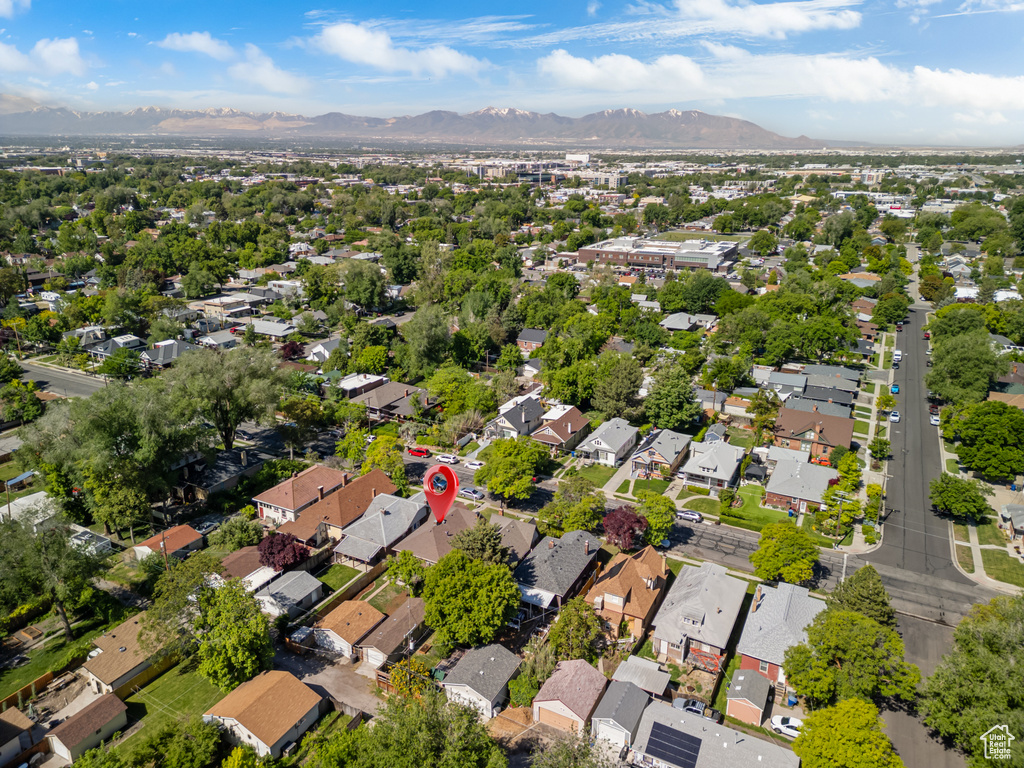 View of property location with mountains and nearby suburban area