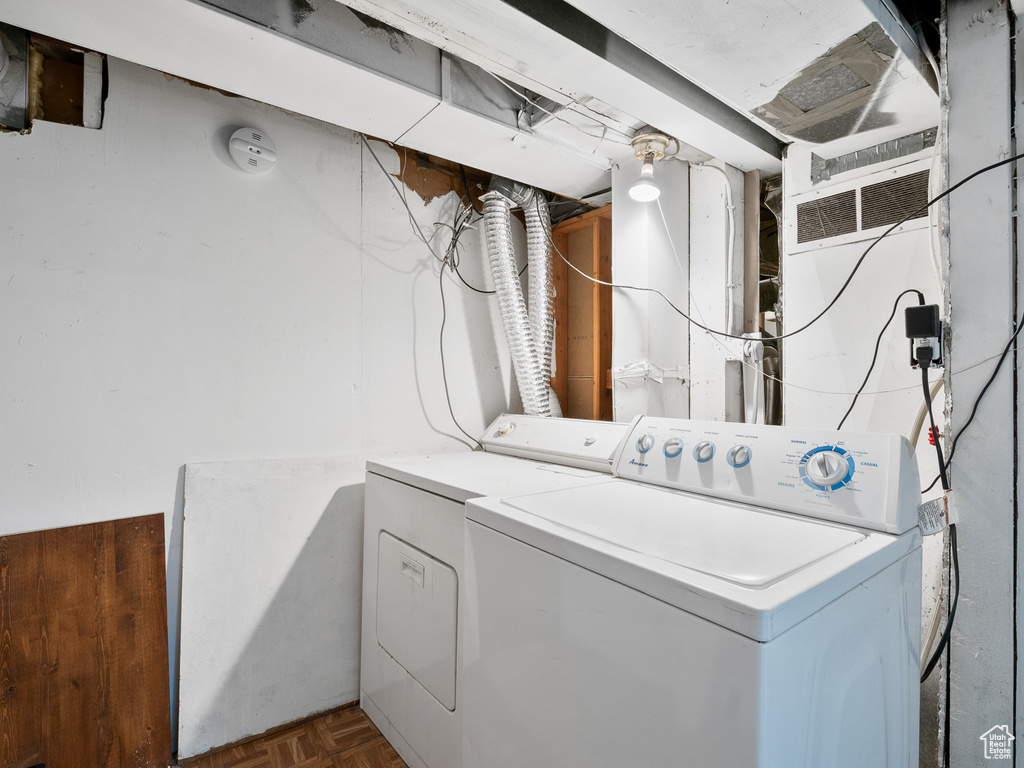 Laundry area featuring separate washer and dryer