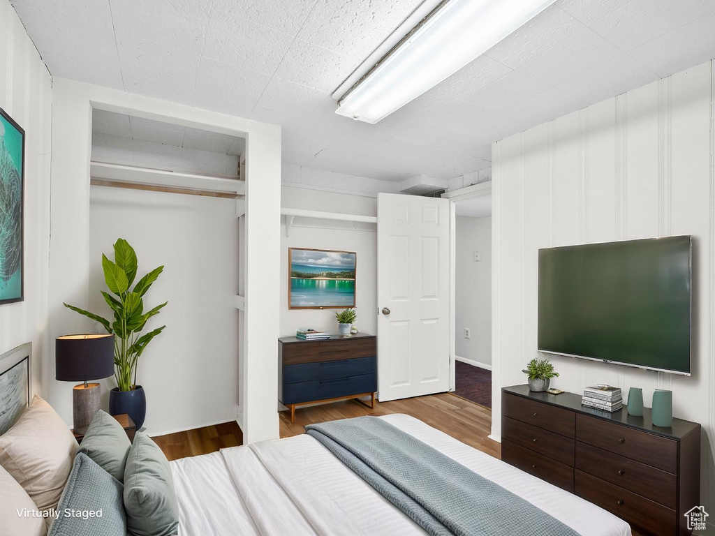 Bedroom featuring wood finished floors