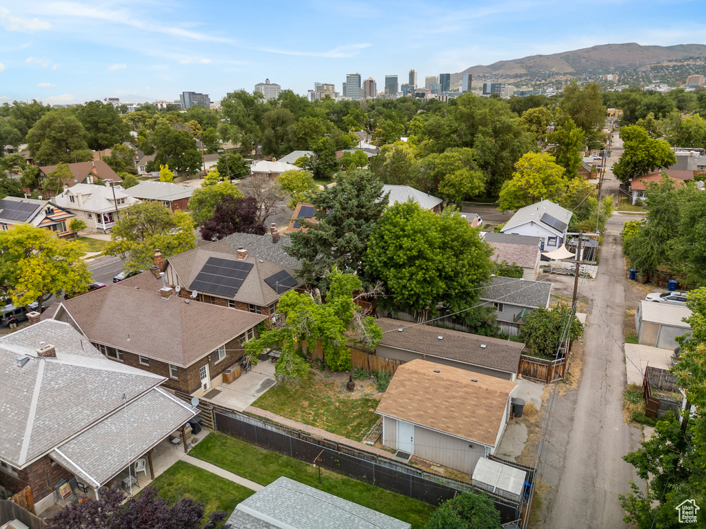 Aerial view of residential area with a mountain backdrop