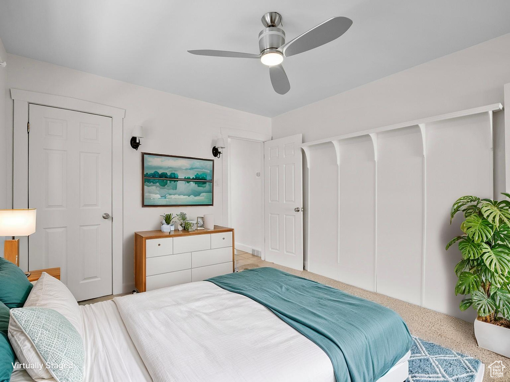Bedroom featuring a ceiling fan