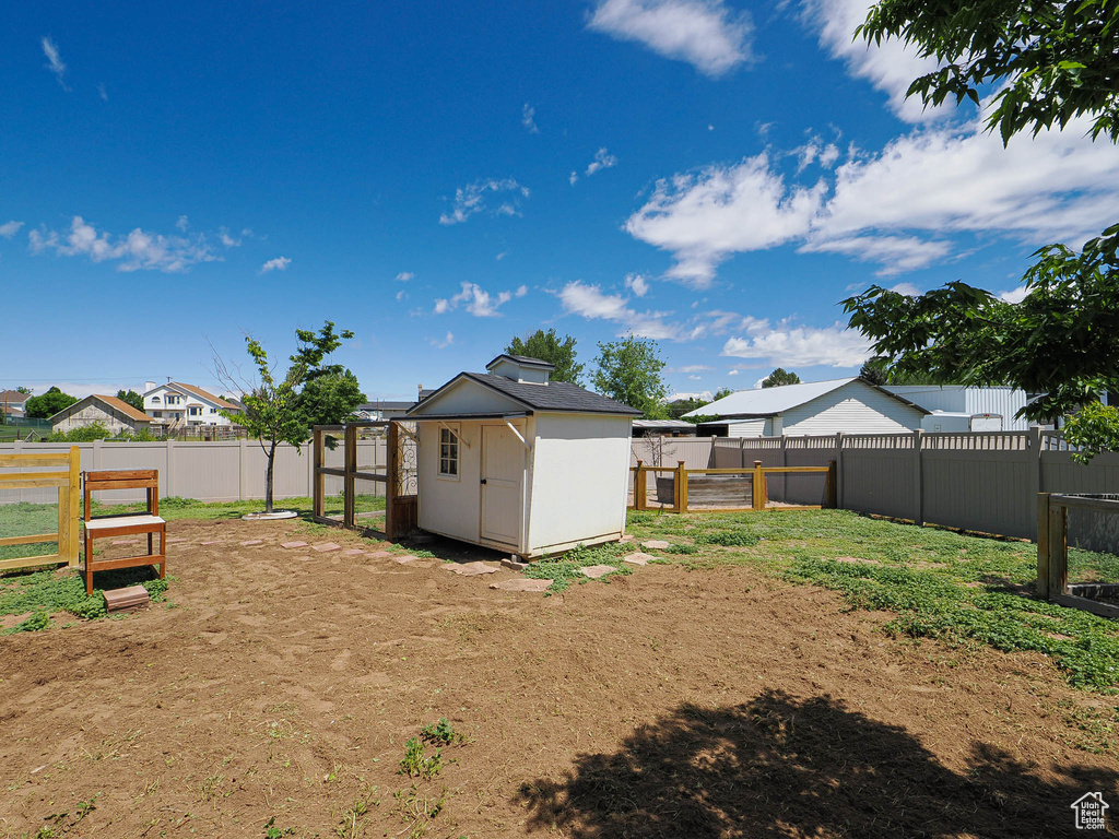 View of fenced backyard