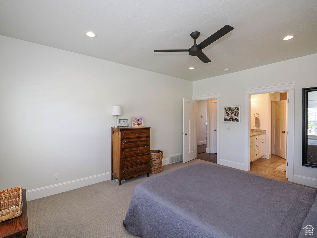 Bedroom with baseboards, recessed lighting, ceiling fan, and connected bathroom