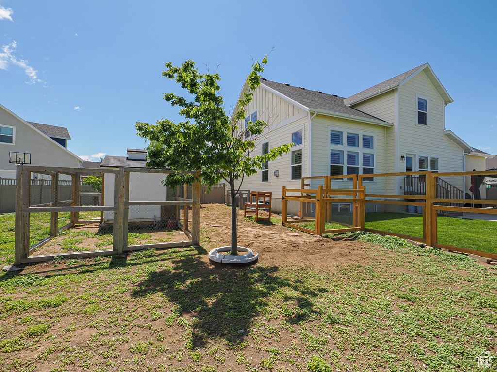 Back of property with board and batten siding
