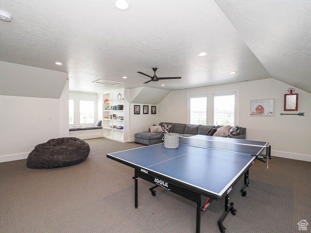 Game room featuring carpet, lofted ceiling, a ceiling fan, recessed lighting, and baseboards
