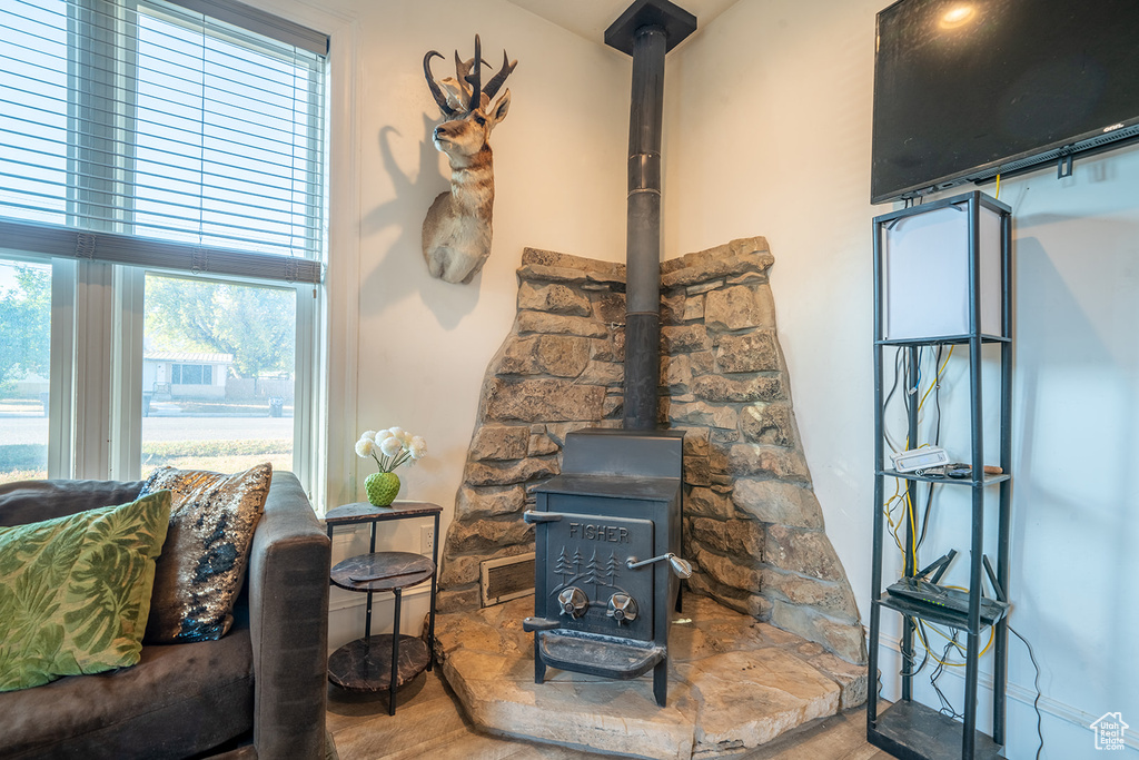 Detailed view of a wood stove and wood finished floors