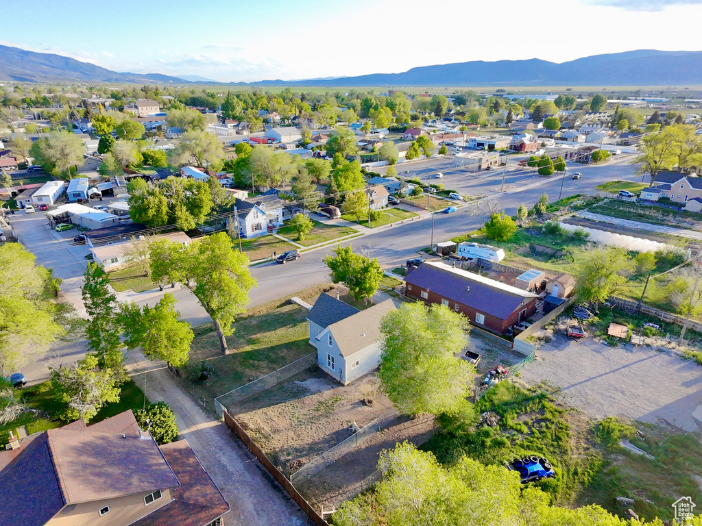 Aerial view of residential area featuring mountains