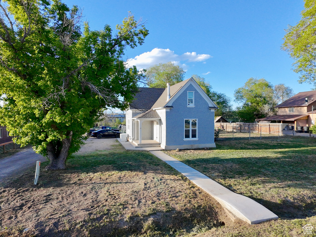 View of front facade with stucco siding