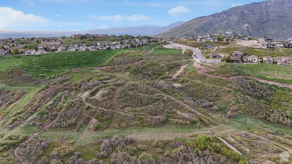 Mountain view featuring nearby suburban area