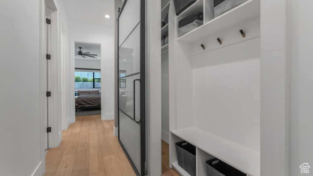 Mudroom with light wood-style floors, recessed lighting, and a ceiling fan