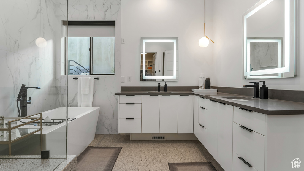 Bathroom with a freestanding bath and double vanity