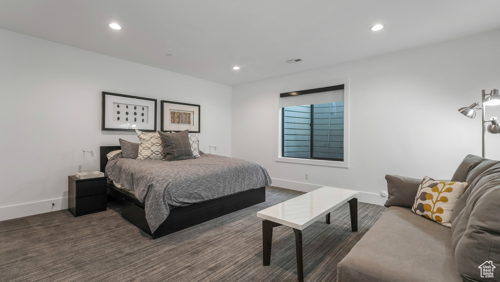Bedroom featuring recessed lighting and baseboards