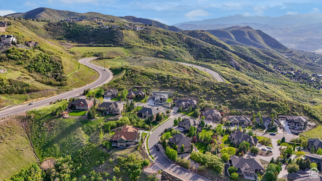 View of property location with nearby suburban area and a mountain backdrop