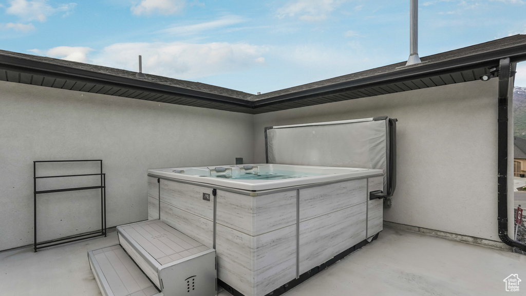 View of patio / terrace featuring a hot tub