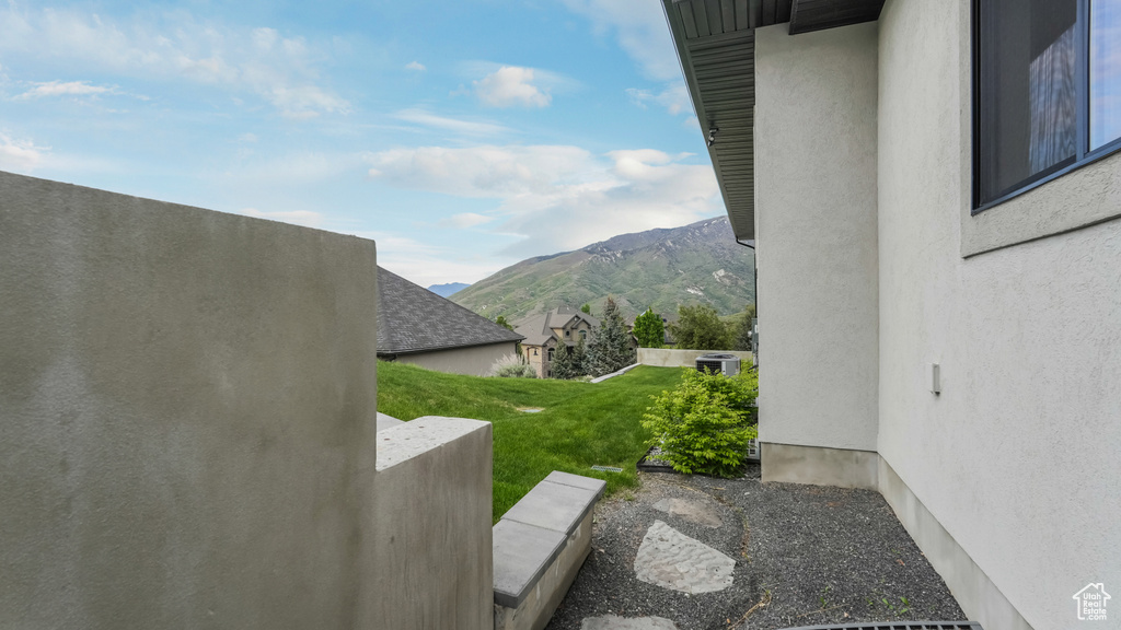View of grassy yard featuring a mountain view