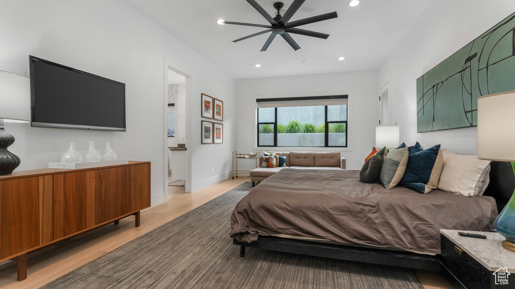Bedroom featuring light wood-style flooring, recessed lighting, baseboards, and ceiling fan