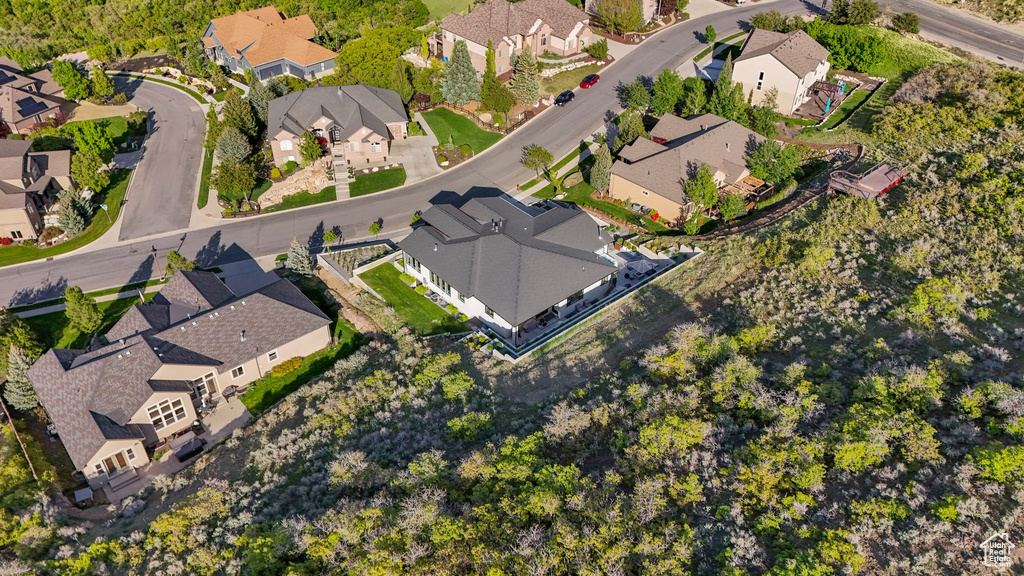 Aerial view of property's location featuring nearby suburban area