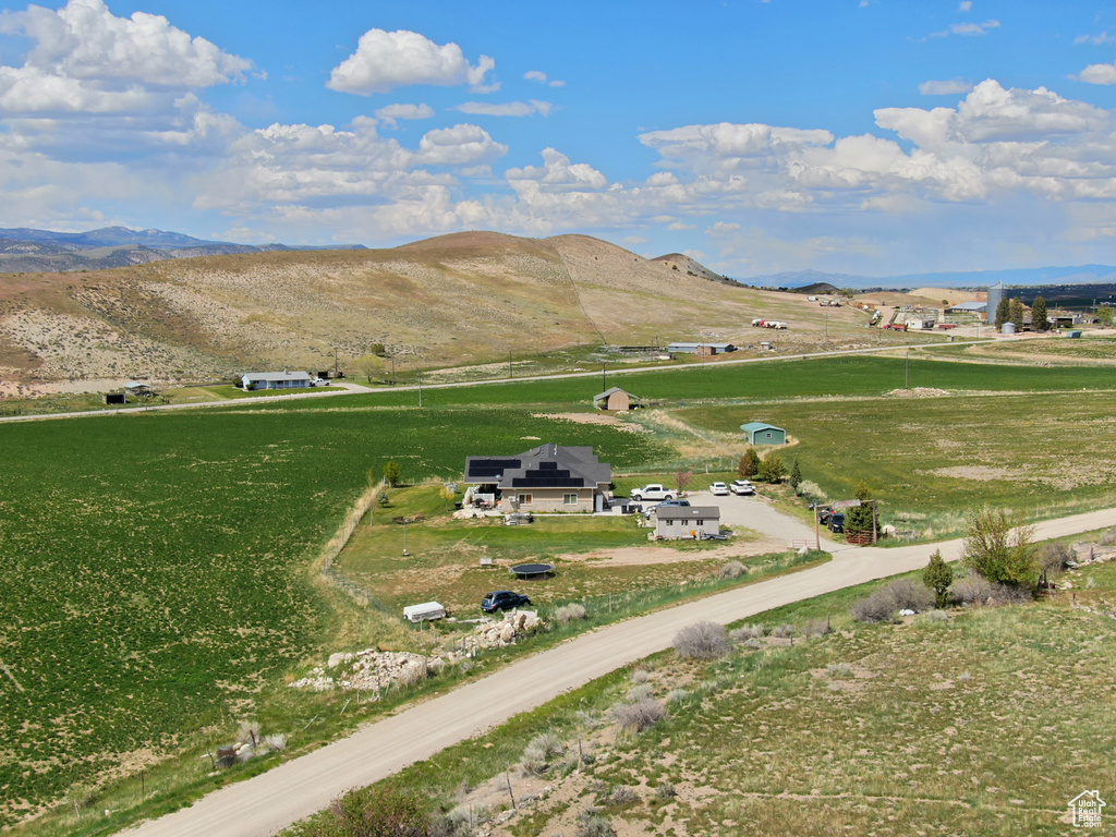 View of mountain backdrop featuring rural landscape