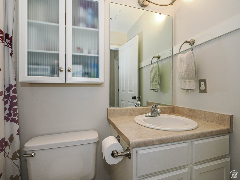 Bathroom featuring toilet and vanity