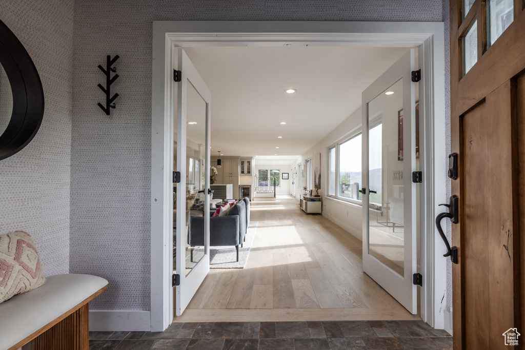 Foyer featuring french doors and recessed lighting