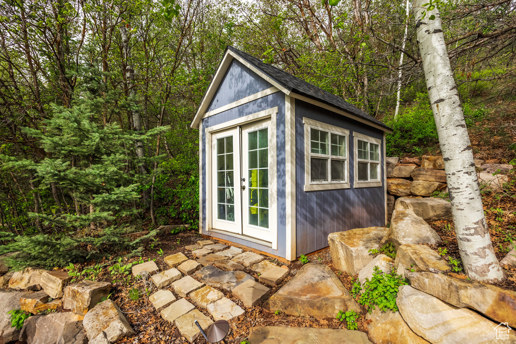 View of outbuilding with french doors