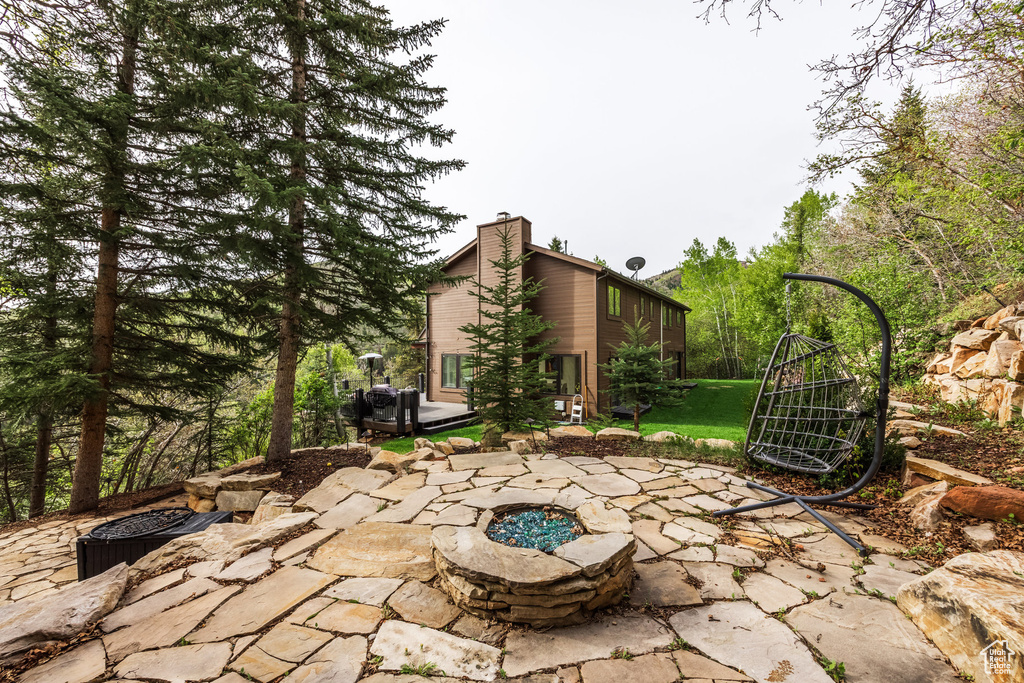 View of patio / terrace featuring a fire pit