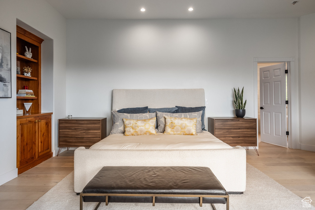 Bedroom featuring light wood finished floors and recessed lighting