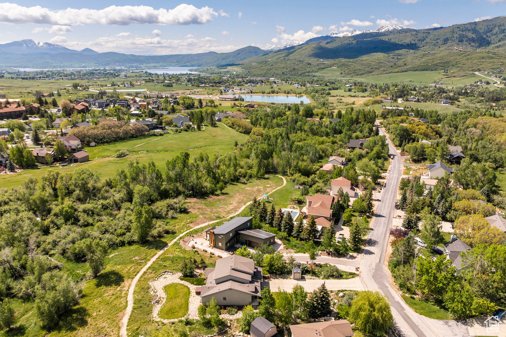 Aerial view of residential area with a water and mountain view