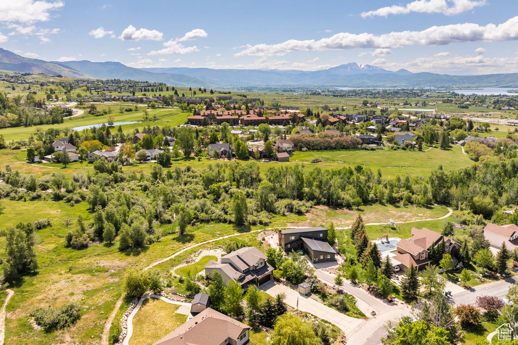 Aerial view of residential area with a water and mountain view