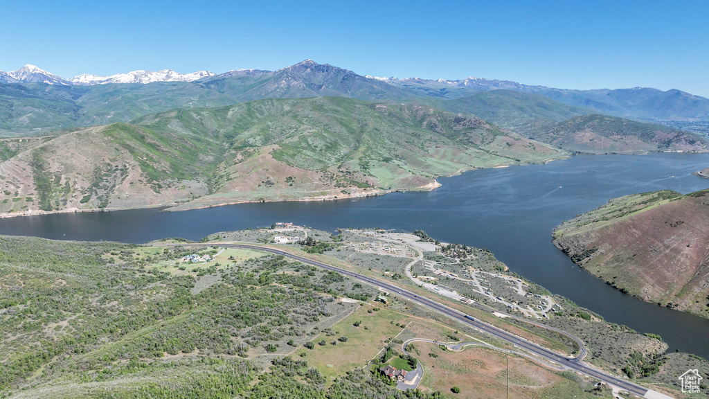 View of mountain background with a nearby body of water