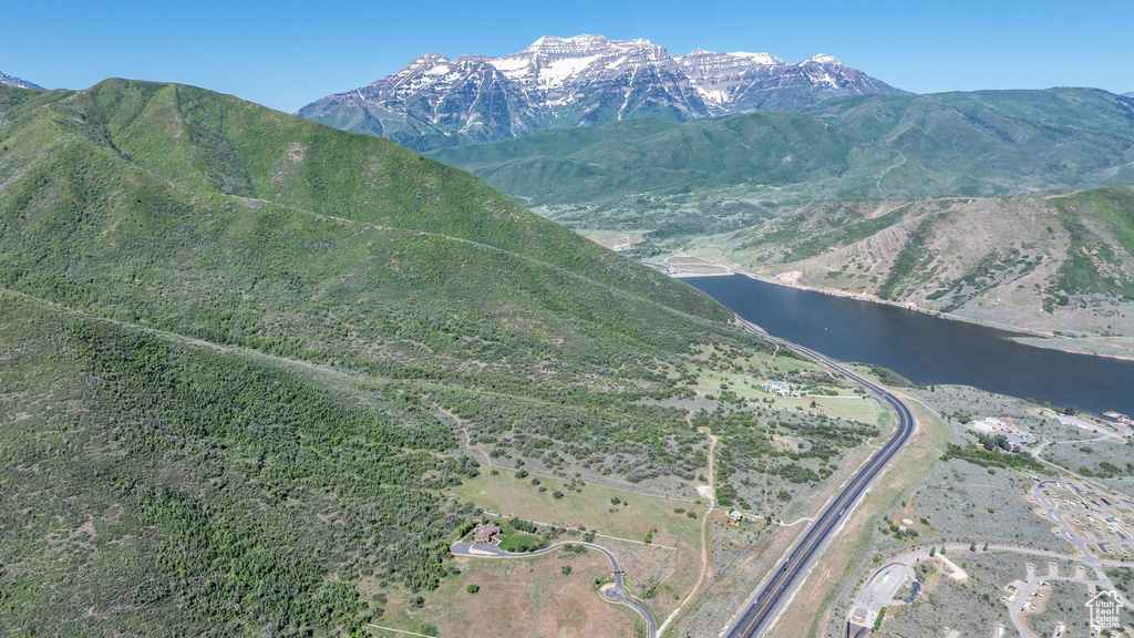 View of mountain backdrop featuring a large body of water