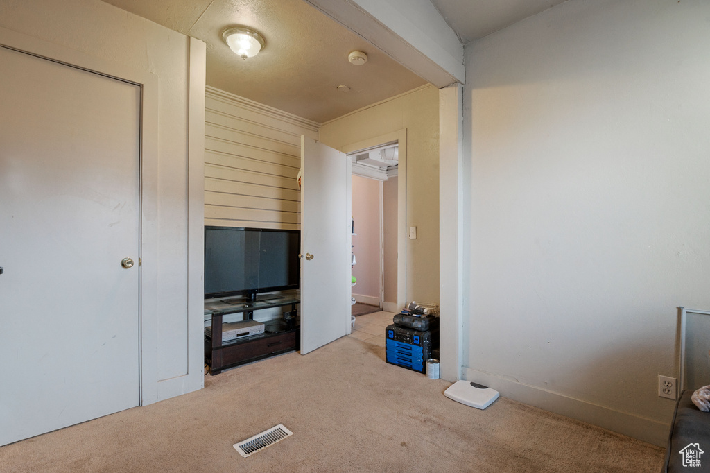 Unfurnished bedroom featuring carpet floors
