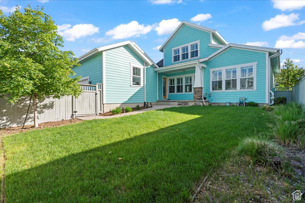 Rear view of house with a gate