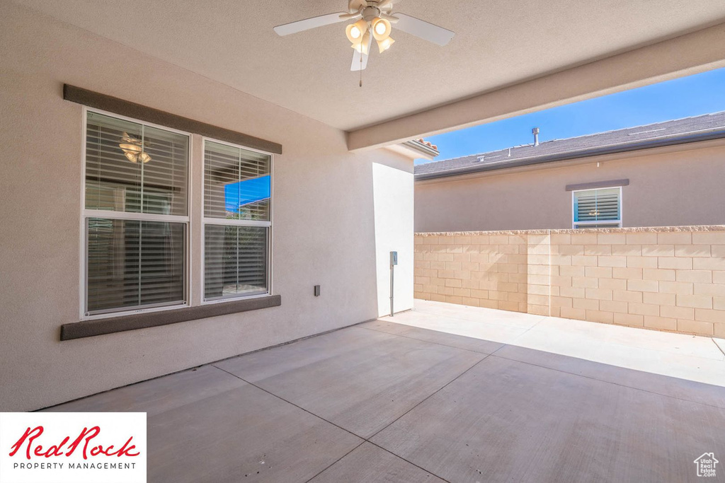 View of patio with a ceiling fan