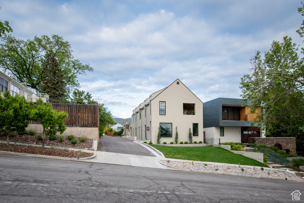 Contemporary house featuring stucco siding