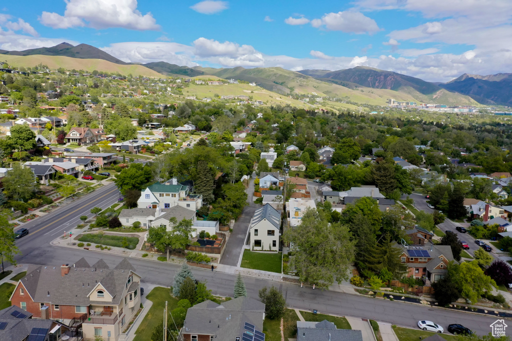 View of property location with mountains and nearby suburban area