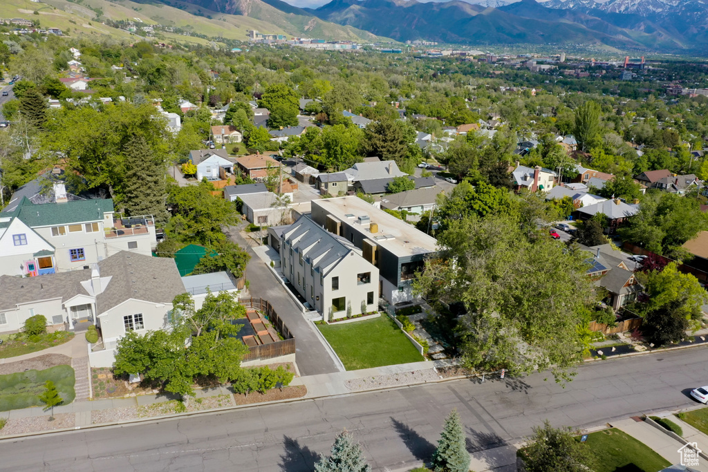 Aerial view of residential area with a mountain backdrop